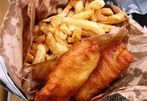 Kalky's  famous fish and chip parcel of hake smothered in hot chips.